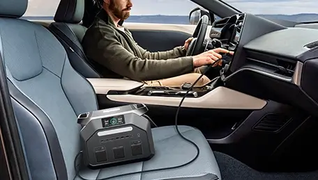 handheld portable power station charged by car charger